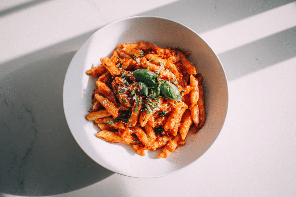 Spicy Arrabbiata One Pot Pasta served in a white bowl