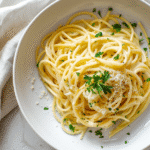 Spaghetti without tomato sauce styled for a food blog