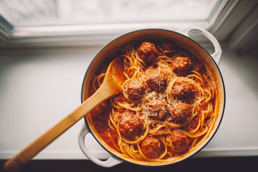 simmering spaghetti and meatballs in one pot. spaghetti and meatballs for one