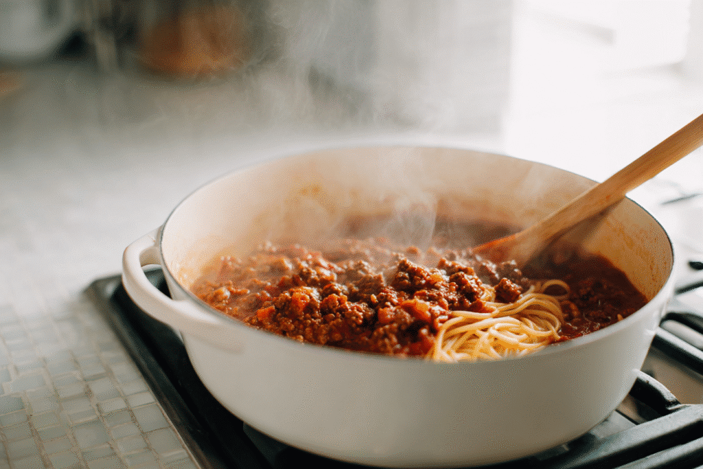 Simmering one-pot spaghetti Bolognese for one on stove